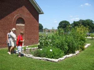 Jacob Hinnen of Ionia, Mich., asked his grandmother, Carol Humbracht of Brownsburg, Inc., and cousin, Mary Simmergren, of Long Beach, Calif., to take him to the Indiana Medical History Museum and Medicinal Plant Garden. © Jo Ellen Meyers Sharp 