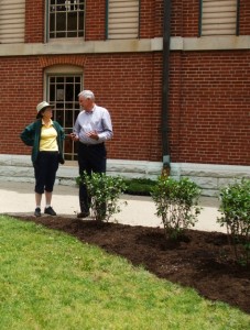 Garden designer Wendy Ford and City Market Manager Jim Reilly discuss the new landscape. (C) Jo Ellen Meyers Sharp