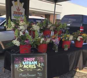 The not-for-profit Indy Urban Acres grows organic cut flowers and sells them at the Market at Hague. Proceeds support its food-growing operations, where produce is donated to local food banks and soup kitchens. Photo courtesy Lauren Brown 