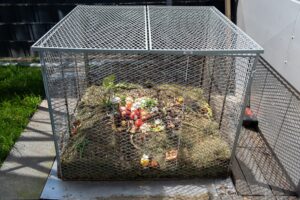 enclosed compost pile