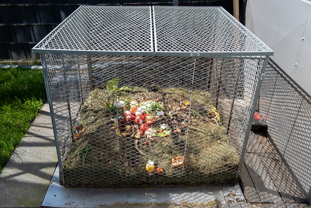 enclosed compost pile